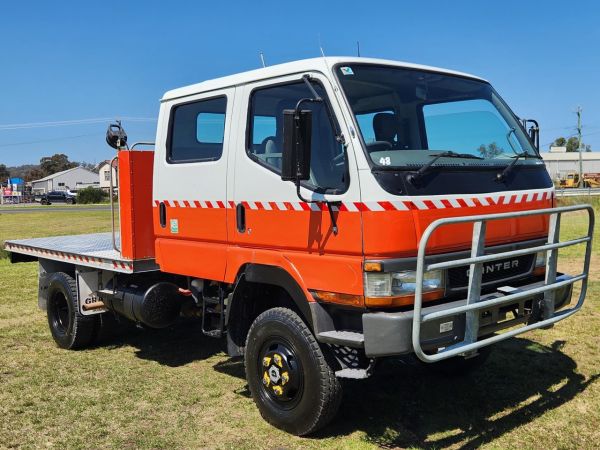 2000 MITSUBISHI FUSO CANTER FG 4X4 Flatbed image