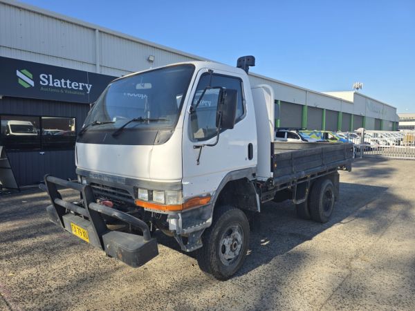 1996 Mitsubishi FG6390 4x4 Tray Truck (ex Fire Truck) image