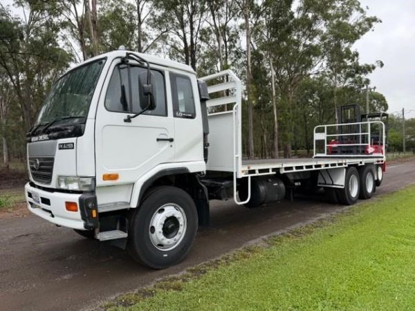 2007 NISSAN UD WITH 12 PALLET TRAY, PRE EMISSION, 9 SPEED SYNCHRO, 460K KMS WITH MOFFETT M7 image