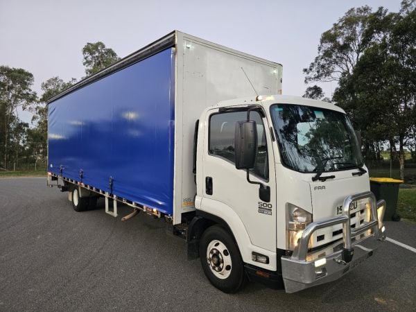2013 Isuzu FRR 500 turbo diesel 6 speed 12 pallet curtainsider truck image