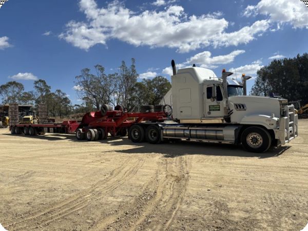 2006 Mack Superliner and 1994 Drake 4x8 Low Loader Float and Dolly Package image