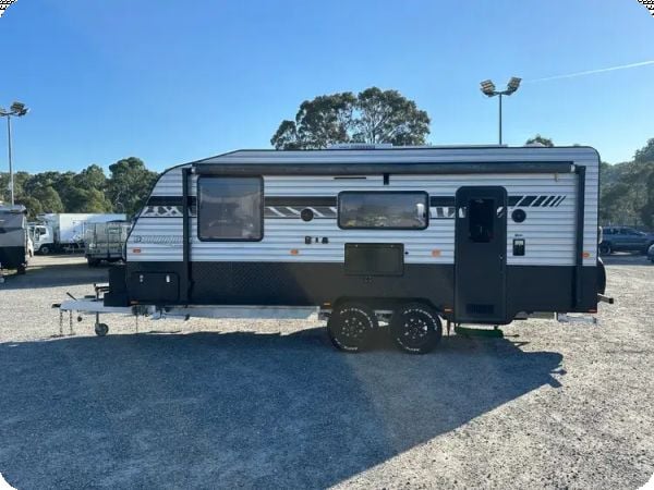 2019 Essential Caravans Adventurer Dual-Axle Caravan 20.6 Foot - keys and books INC image