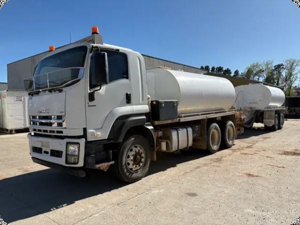 2011 Isuzu FXZ 6x4 Water Truck (Manual) & 2005 Henry Hope Bogie Axle Water Tanker Pig Trailer (Council Assets) image